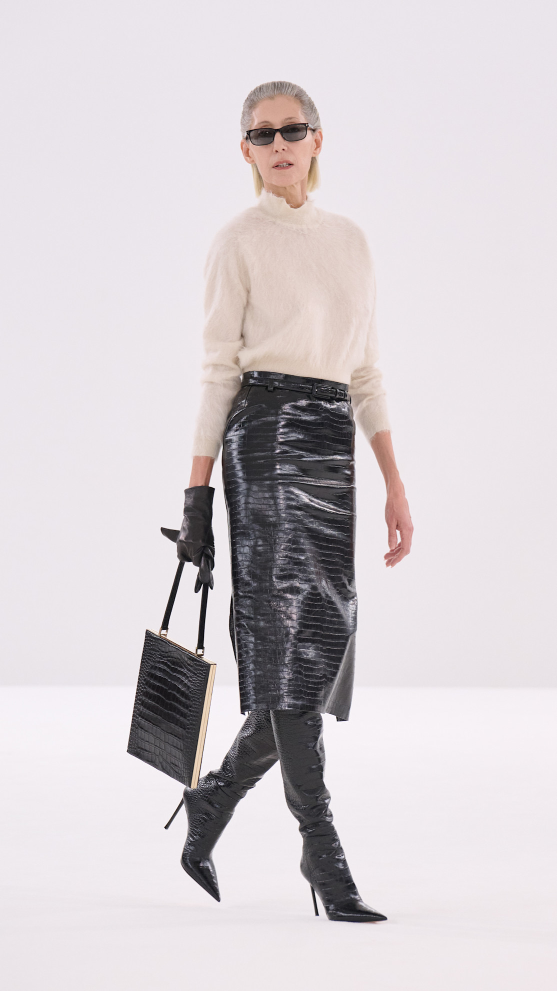 tom ford model walks the runway.