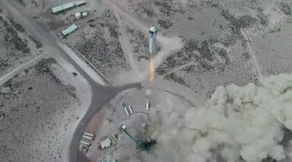 Blue Origin's New Shepard rocket launches the crew capsule RSS First Step on an uncrewed suborbital test flight from the company's Launch Site One in West Texas on April 14, 2021.