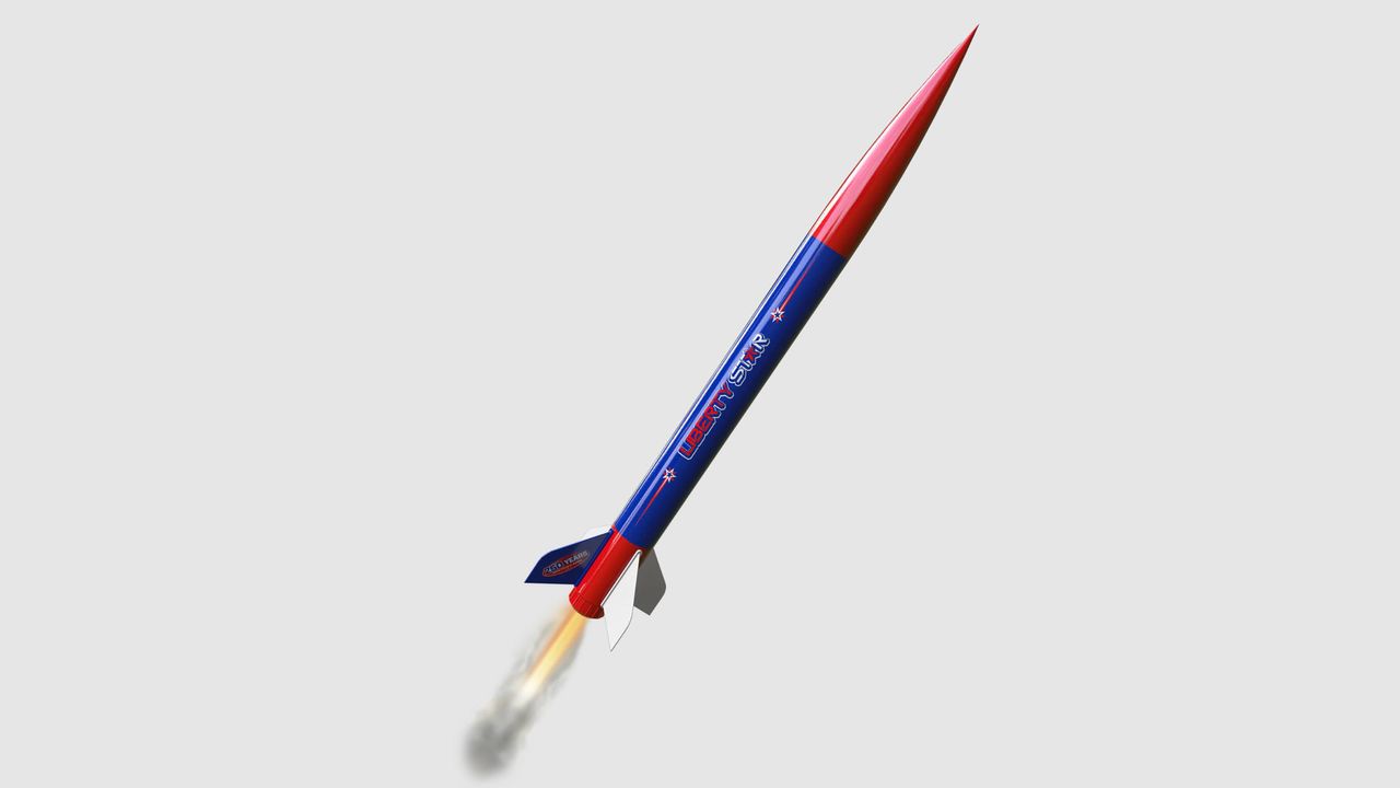 The Estes Liberty Star launching upwards on a grey background.