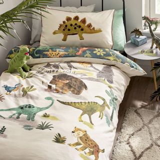 dinosaur bedding with rug and toys