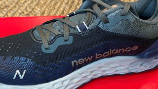 Close up of the branding on a New Balance Fresh Foam Hierro v6 shoe