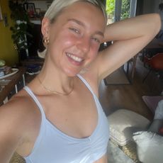 Health writer Ash trying headstands in yoga at home