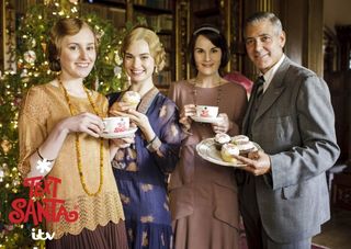 George Clooney with Laura Carmichael, Lily James and Michelle Dockery