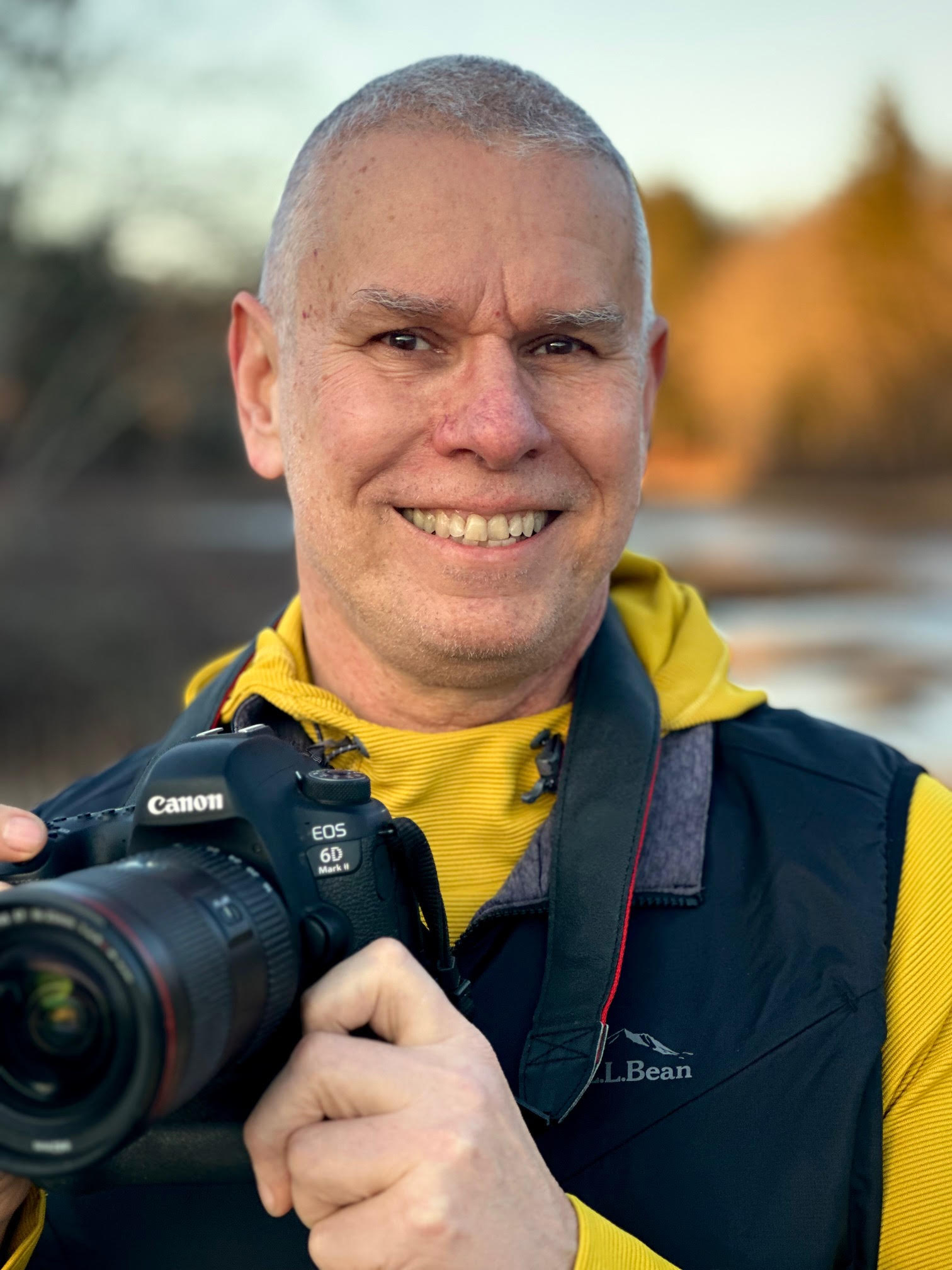 Horticulturalist, Matt Mattus holding a camera