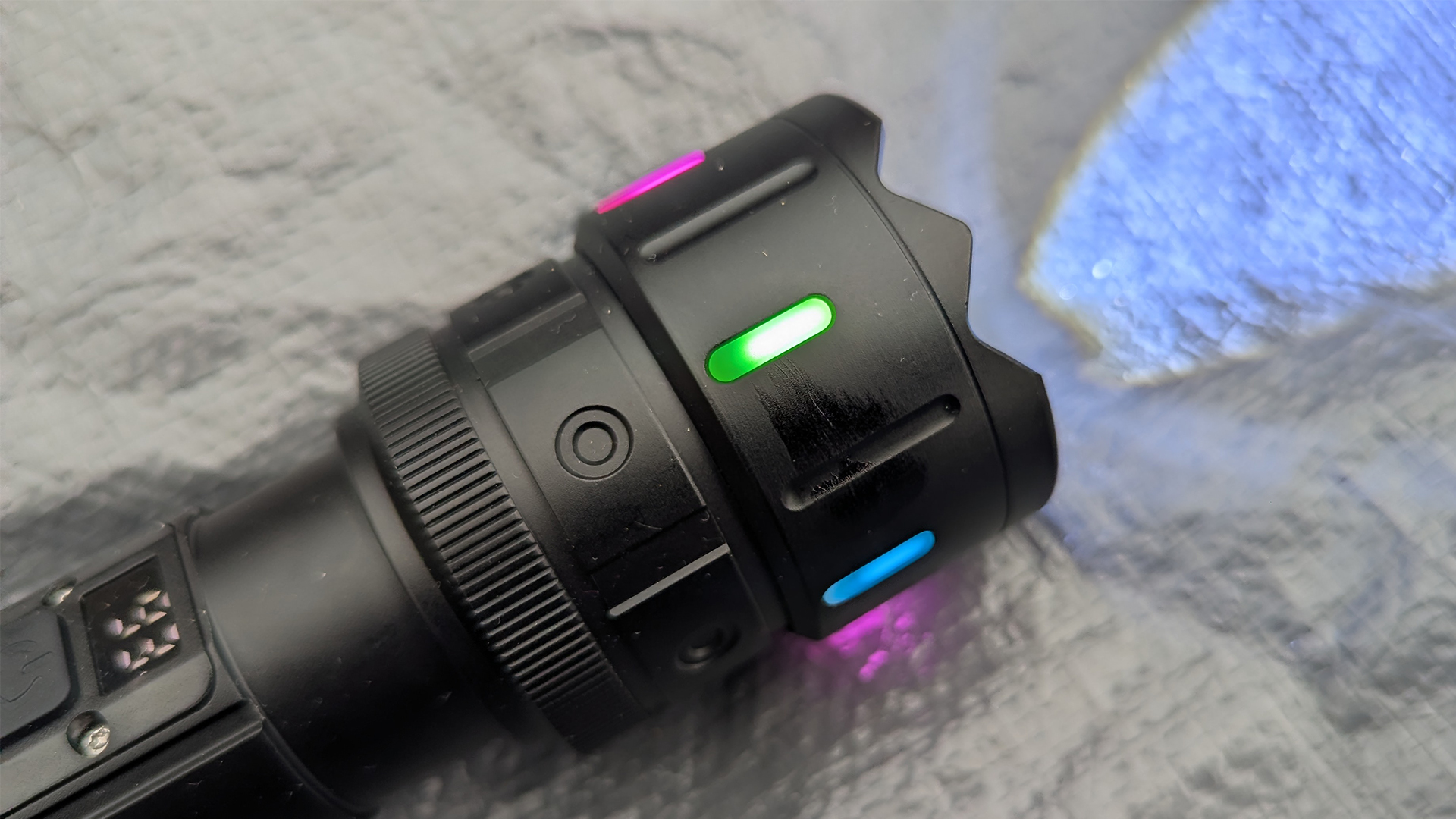 Windfire Flashlight during review, lying on a groundsheet of a tent.