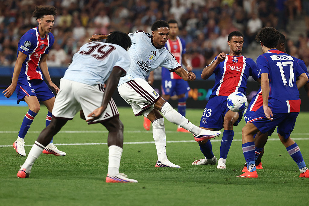 Aston Villa's English midfielder #53 George Hemmings (C) shoots during the UEFA Supercup football match