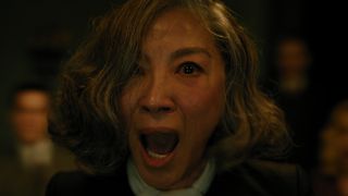 Michelle Yeoh as Mrs. Reynolds in 20th Century Studios' A HAUNTING IN VENICE