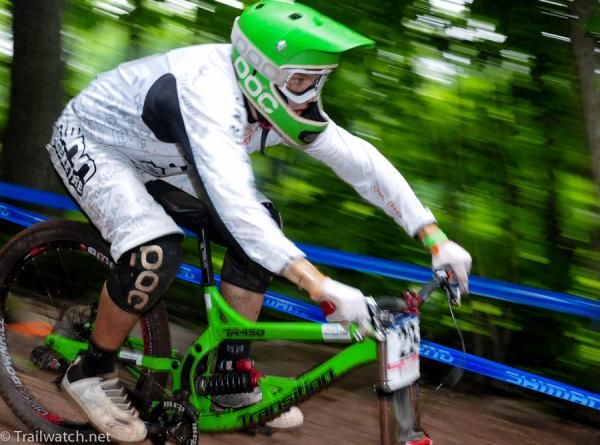 A rider streaks down the course