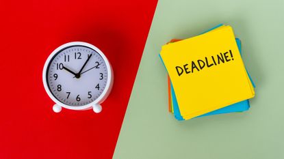 Clock and a sticky note that reads "Deadline!" on a green and red background