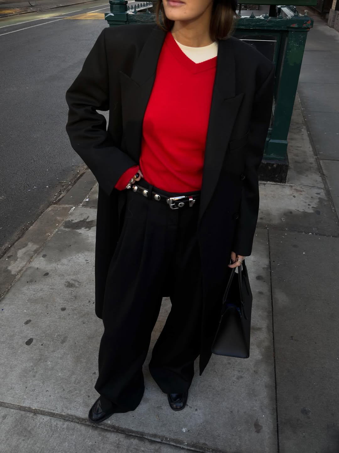 Woman wearing popular anti trend wardrobe items 2026.