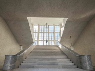 Grand staircase and large window inside Kunstmuseum Basel