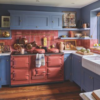 terracotta restored aga in blue kitchen