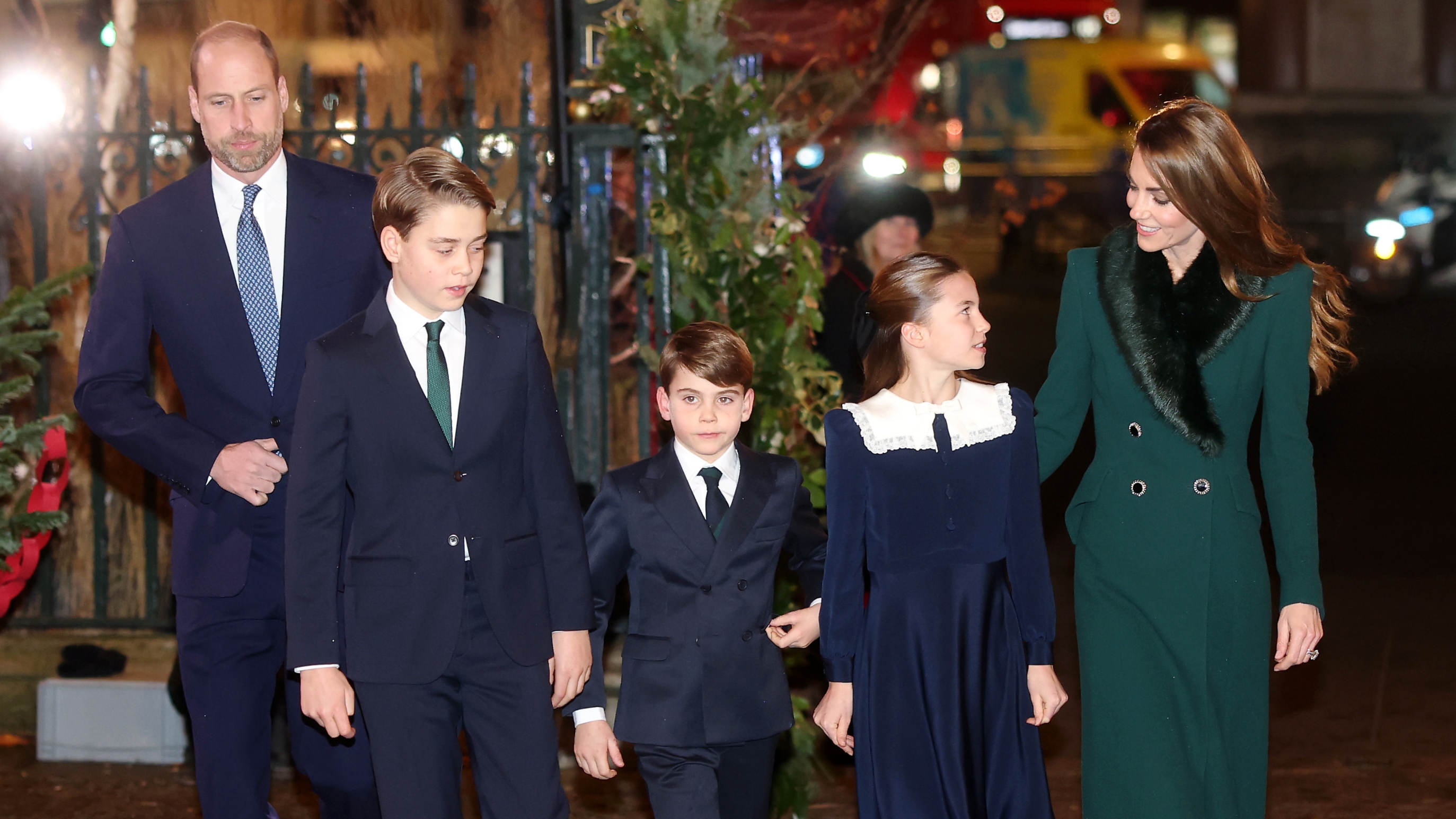 Prince William, Prince George of Wales, Prince Louis of Wales, Princess Charlotte of Wales and Catherine, Princess of Wales attend the 'Together At Christmas' Carol Service