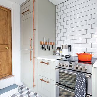 kitchen with wooden door and cupboard