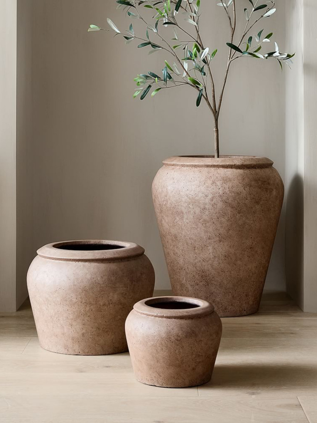 A small washed ficonstone planter from West Elm