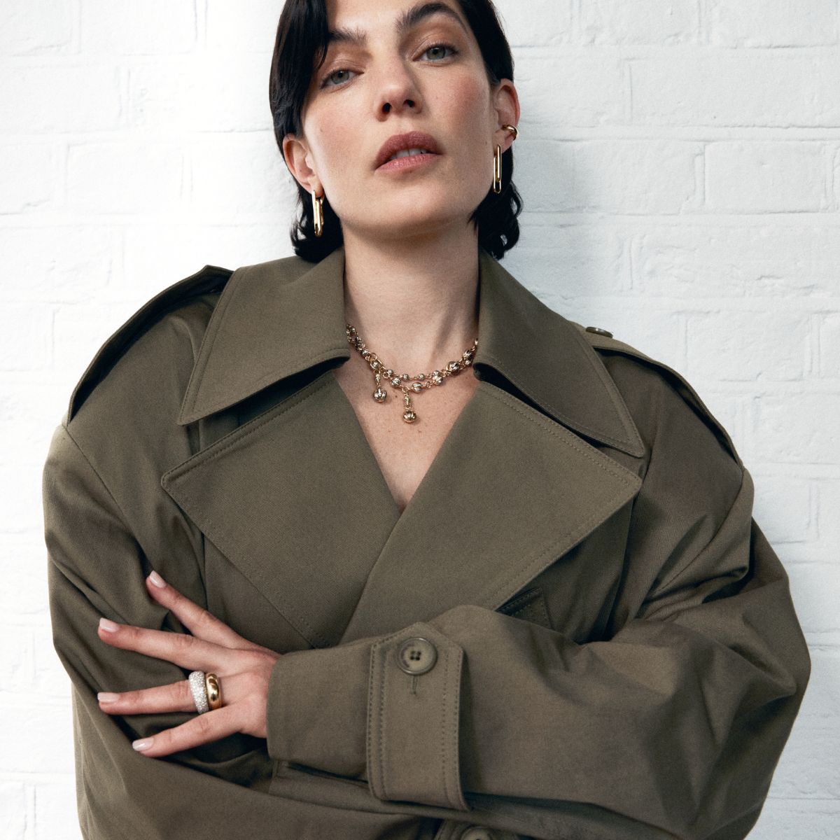 a model wearring diamond and gold jewellery by lucy delius