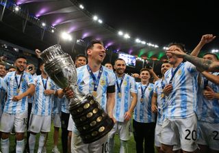 How to watch Copa America 2024 live streams from anywhere in the world: Lionel Messi of Argentina smiles with the trophy as he celebrates with teammates after winning the final of Copa America Brazil 2021 between Brazil and Argentina at Maracana Stadium on July 10, 2021 in Rio de Janeiro, Brazil.