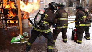 Jake Lockett as Sam Carver, Christian Stolte as Randy "Mouch" McHolland in Chicago Fire season 12