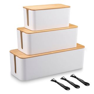 Three white cable management boxes with bamboo lids