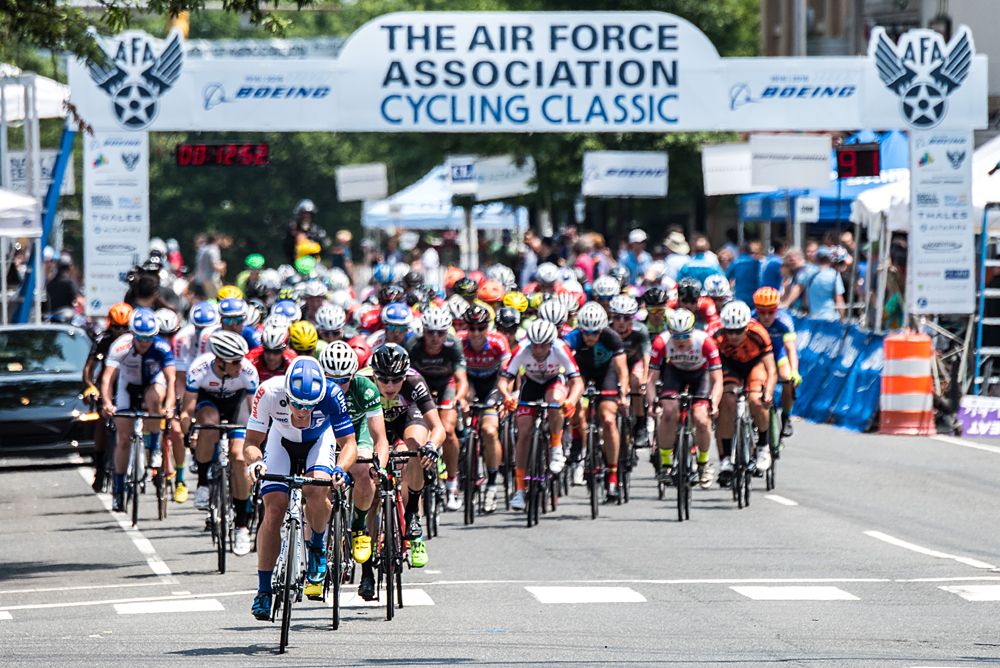 The peloton starts to bunch up part way through the day at Air Force Association Cycling Classic