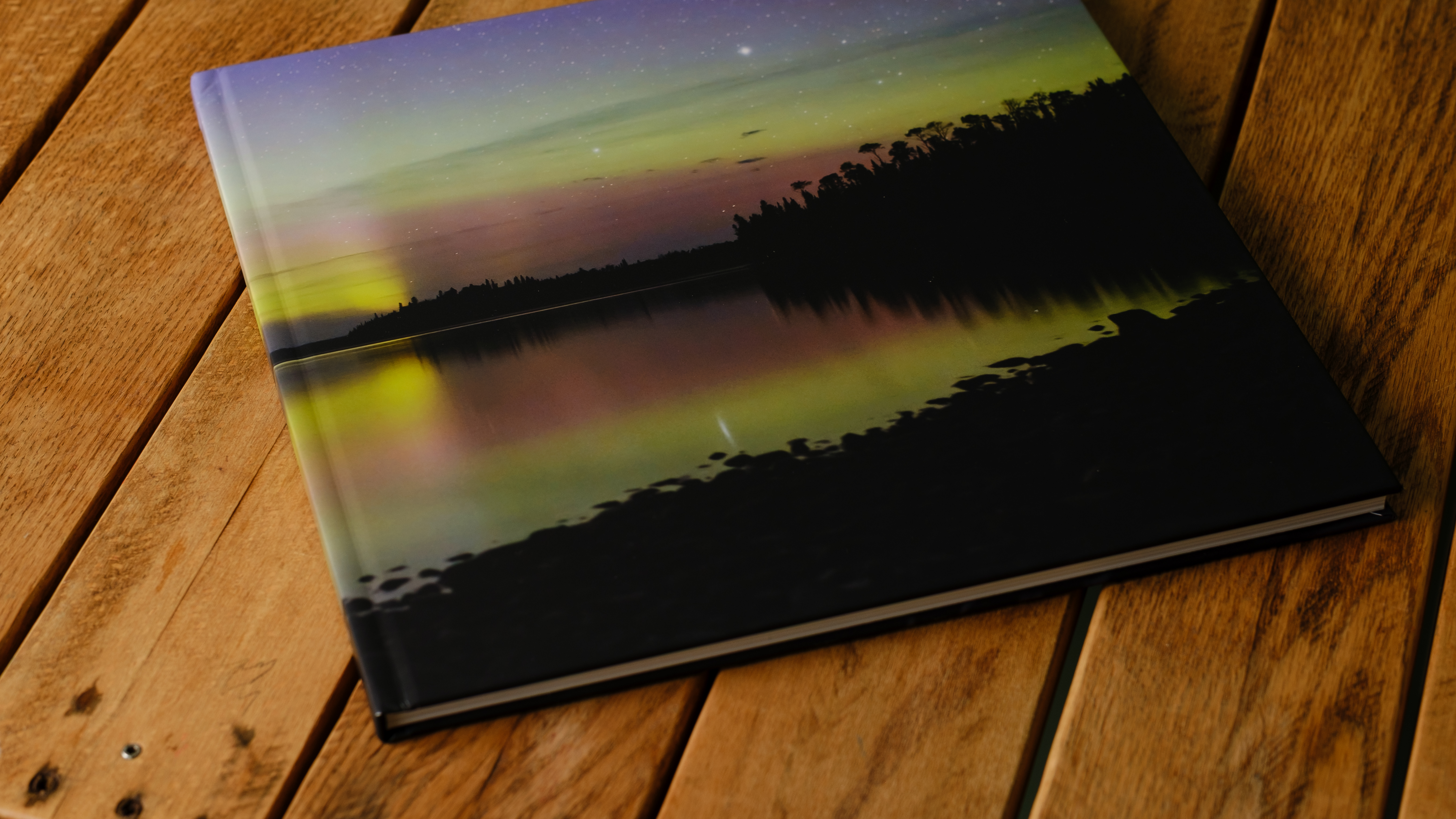 Photo books from Saal on a desktop