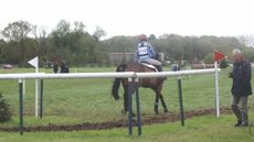A rider rides our of the cross-country start box.