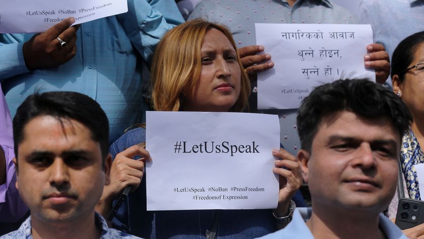 Nepali journalists display placards calling on the government to backtrack on its decision to impose a ban on social media, citing non-compliance with its order to get registered, during a protest in Kathmandu, Nepal, on September 7, 2025.
