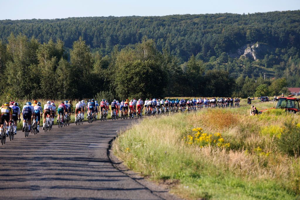 KRAKOW POLAND AUGUST 05 A general view of the peloton passing through a landscape during the 79th Tour de Pologne 2022 Stage 7 a 1778km stage from Valsir to Krakow TdP22 WorldTour on August 05 2022 in Krakow Poland Photo by Bas CzerwinskiGetty Images