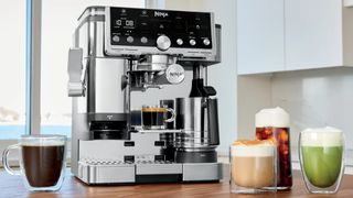 Ninja Luxe Café Pro coffee machine on kitchen counter with various coffee drinks