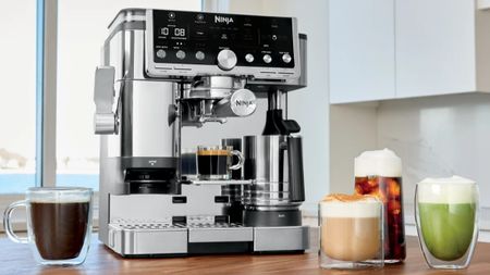 Ninja Luxe Caf&eacute; Pro coffee machine on kitchen counter with various coffee drinks