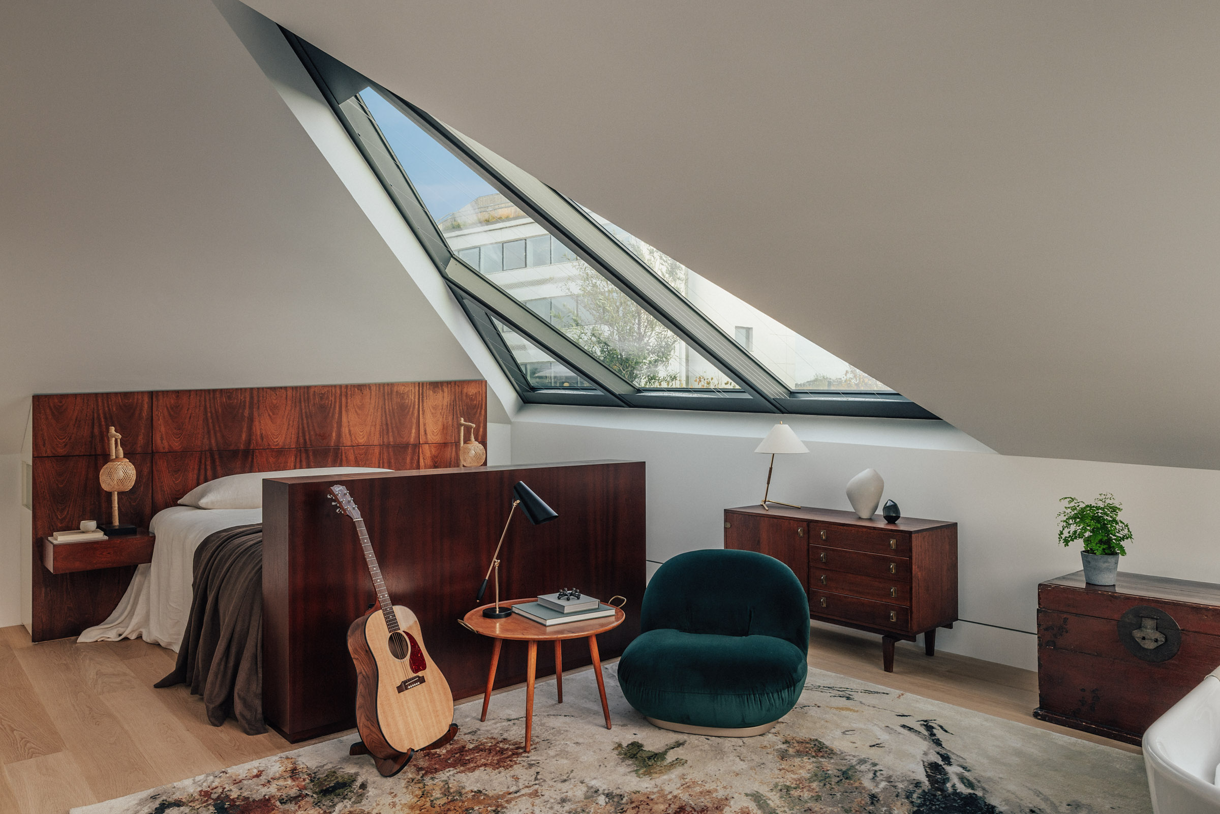 The primary bedroom suite occupies the entire fifth floor