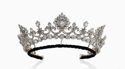Diamond and pearl tiara against a pale grey background