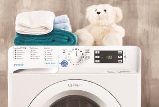washing machine with teddy