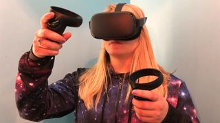 A photo of Becca wearing the Oculus Quest