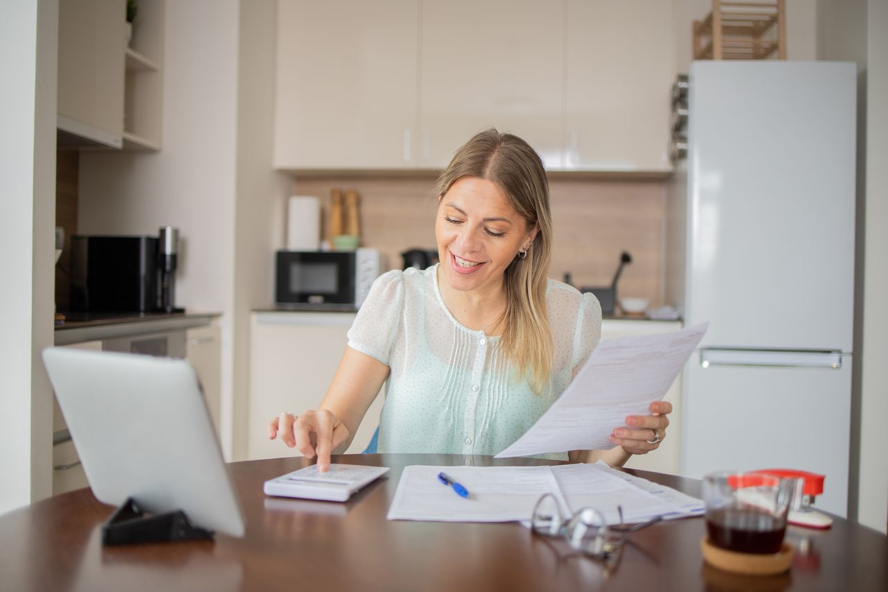 Woman looking at paperwork