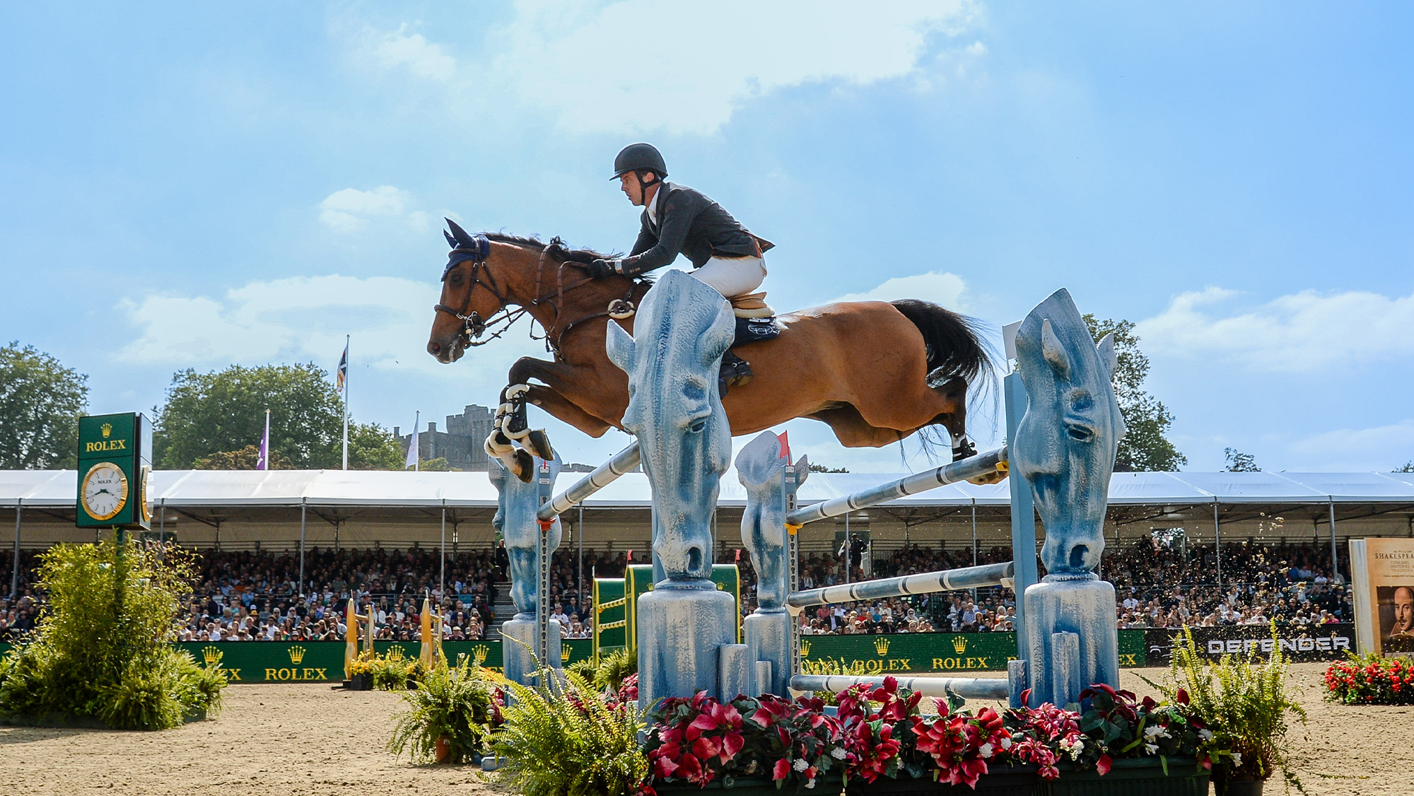 Harrie Smolders riding Monaco at the Royal Windsor Horse Show 2025 in front of the stands