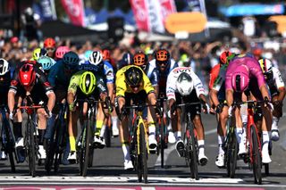 NAPLES ITALY MAY 12 LR Alberto Dainese of Italy and Tudor Pro Cycling Team Olav Kooij of Netherlands and Team Visma Lease a Bike Davide Ballerini of Italy and Astana Qazaqstan Team Jonathan Milan of Italy and Team Lidl Trek Purple Points Jersey sprint at finish line during the 107th Giro dItalia 2024 Stage 9 a 214km stage from Avezzano to Naples UCIWT on May 12 2024 in Naples Italy Photo by Tim de WaeleGetty Images