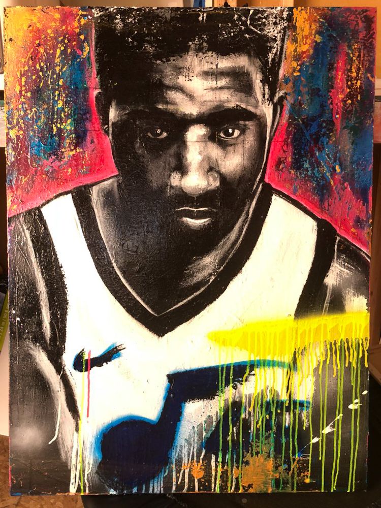 TJ Eisenhart created this portrait of NBA star Donovan Mitchell with acrylic and spray paint.