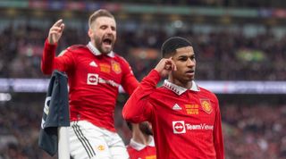 Marcus Rashford and Luke Shaw of Manchester United celebrate after Rashford scored their side's second goal in the Carabao Cup final between Manchester United and Newcastle United at Wembley Stadium on 26 February, 2023 in London, United Kingdom.