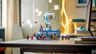 Lego Battle Bus being played with in a home setting, with the set and minifigures on a table