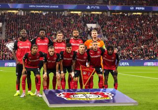 Players of Bayer 04 Leverkusen line up for a team picture ahead of the UEFA Champions League 2024/25 League Phase MD2 match between Bayer 04 Leverkusen and AC Milan at BayArena on October 1, 2024 in Leverkusen, Germany.