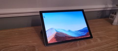 A Microsoft Surface Pro 7 Plus on a wooden table
