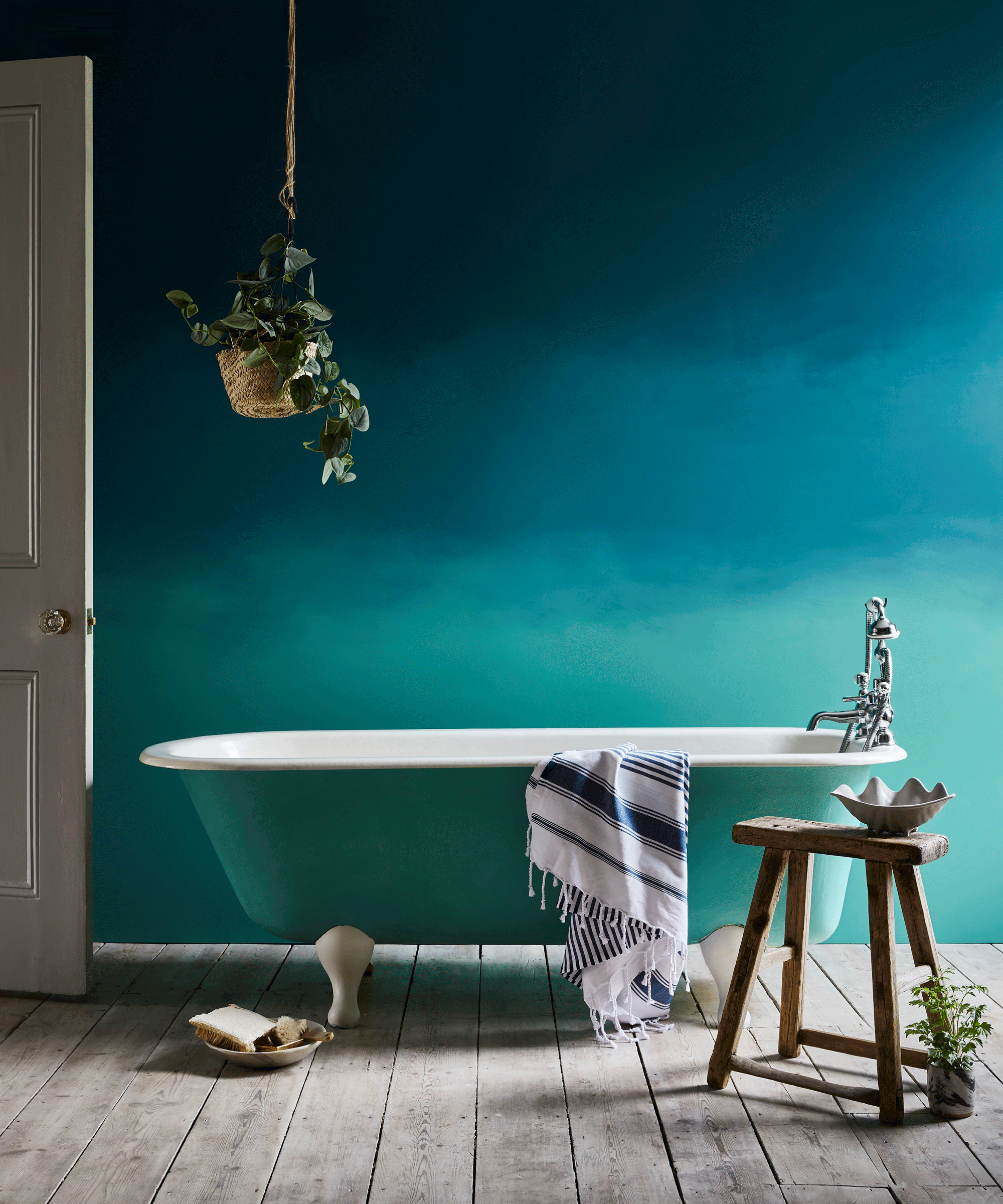 blue bathroom with ombre paint effect and free standing tub