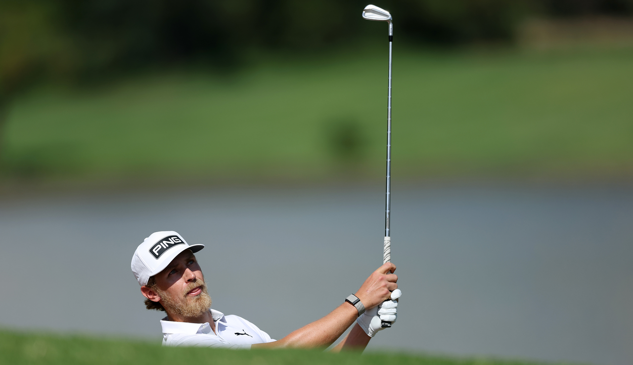 Kristoffer Reitan hits an iron shot