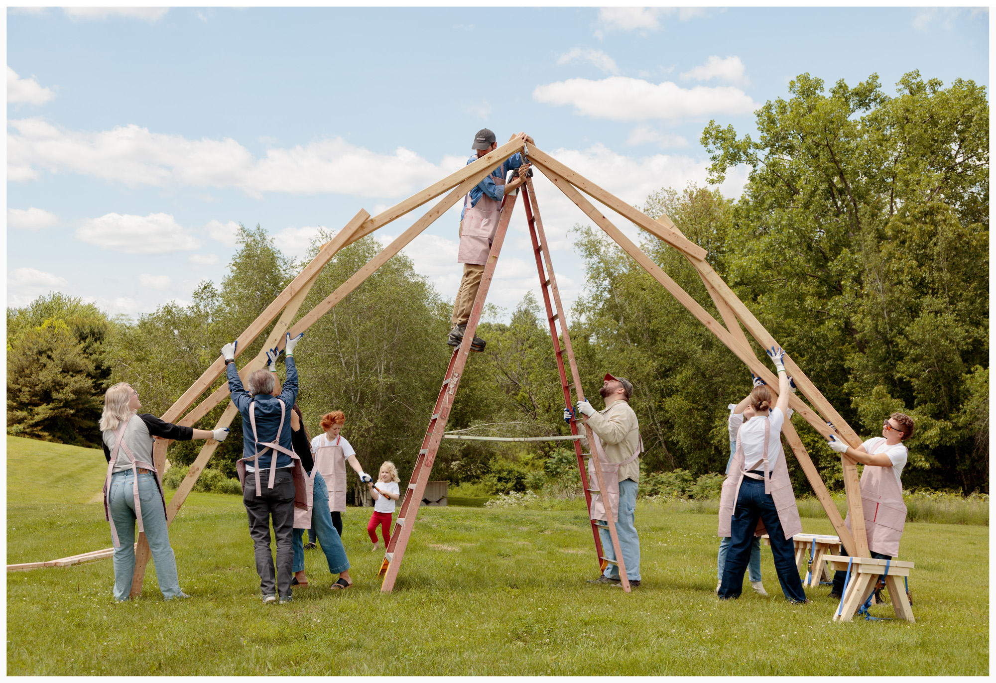 raising a barn on green grass