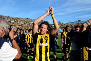 Diego Forlan of Penarol acknowledges the fans after a match, 2015