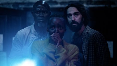 Djimon Hounsou as Henri, Lupita Nyong'o as Samira, and Alex Wolff as Reuben in A Quiet Place: Day One.