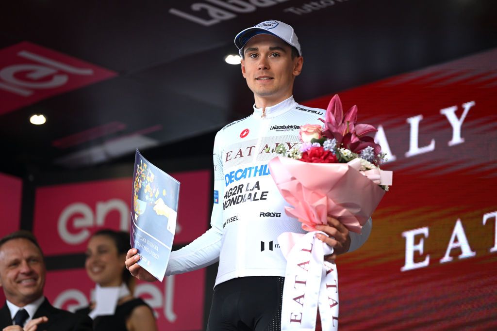 TORINO ITALY MAY 04 Alex Baudin of France and Decathlon AG2R La Mondiale Team celebrates at podium as White Best Young Rider Jersey winner during the 107th Giro dItalia 2024 Stage 1 a 140km stage from Venaria Reale to Torino UCIWT on May 04 2024 in Torino Italy Photo by Dario BelingheriGetty Images