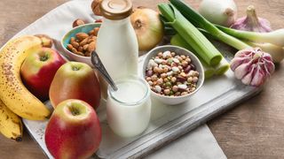 prebiotic foods including apples, bananas, nuts and seeds