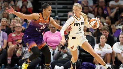Alyssa Thomas and Sophie Cunningham are seen during a WNBA game between Phoenix and Indiana.